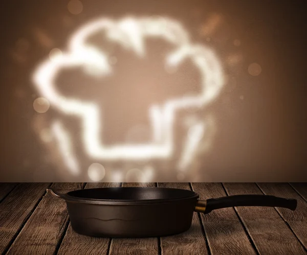 Chef hat above cooking pot — Stock Photo, Image