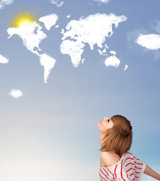 Young girl looking at world clouds and sun on blue sky — Stock Photo, Image