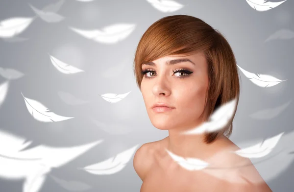 Beautifull young girl with light feather skin concept — Stock Photo, Image