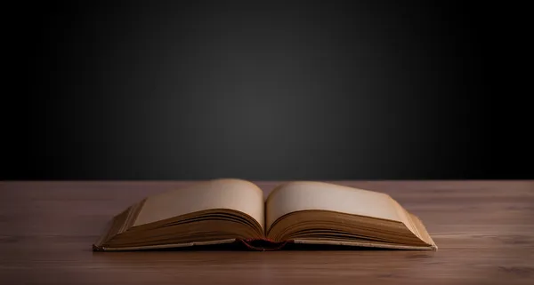 Open book on wooden deck — Stock Photo, Image