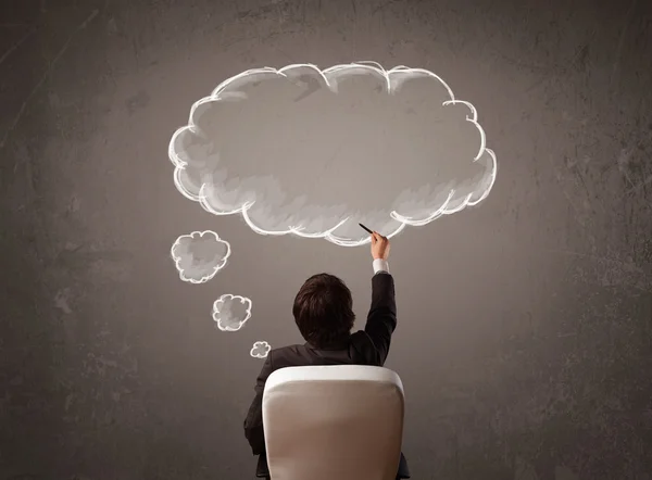 Businessman sitting with cloud thought above his head — Stock Photo, Image