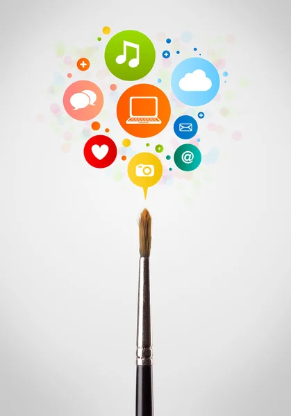 Brush close-up with social network icons — Stock Photo, Image