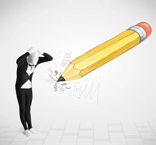 Guy in body mask with a big hand drawn pencil — Stock Photo, Image