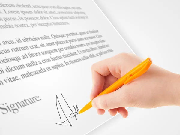 Hand writing personal signature on a paper form — Stock Photo, Image