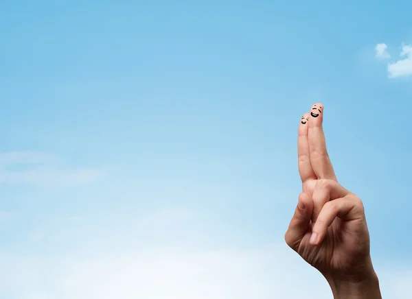 Happy smiley fingers looking at clear blue sky copyspace — Stock Photo, Image