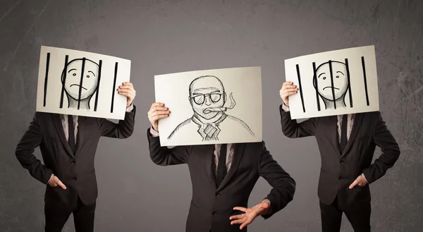 Men in formal gesturing with cardboard in front of their head — Stock Photo, Image