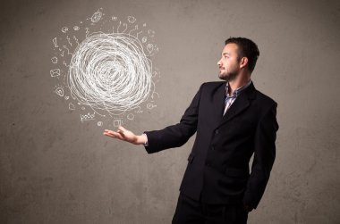 Bir iş adamının elinde kaos kavramı