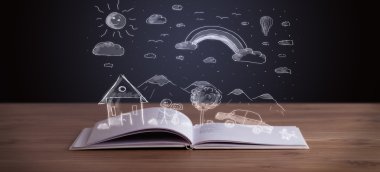 Elle çizilmiş peyzaj ile açık kitap