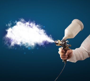Painter with airbrush gun and white magical smoke clipart