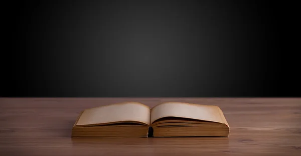 Open book on wooden deck — Stock Photo, Image