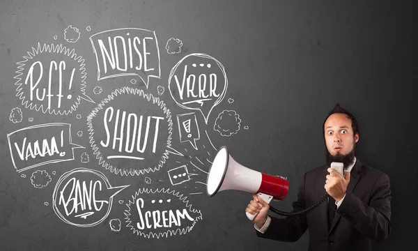 Guy in suit yelling into megaphone and hand drawn speech bubbles — Stock Photo, Image