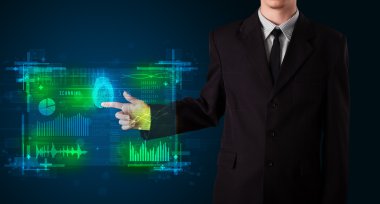 genç işadamı modern teknoloji paneli ile parmak p tuşuna basın