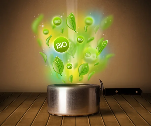 Bio signs coming out from cooking pot — Stock Photo, Image