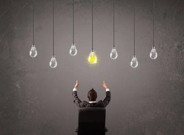 Businness guy in front of idea light bulbs concept — Stock Photo, Image