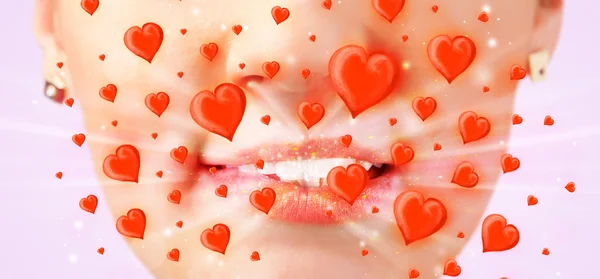 Pretty lady lips with lovely red hearts — Stock Photo, Image