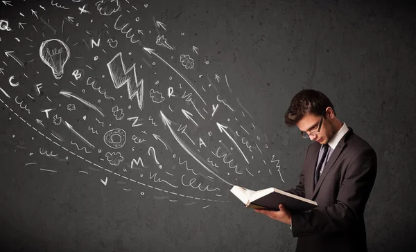 Young man reading a book — Stock Photo, Image