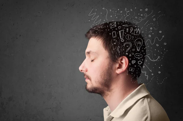 Young man thinking with abstract lines and symbols — Stock Photo, Image