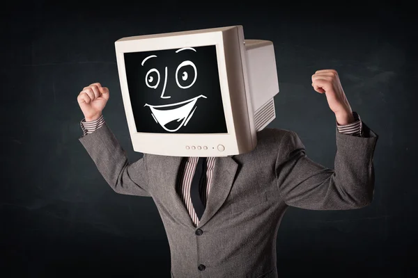 Hombre de negocios feliz con una cabeza de monitor de PC y una cara sonriente — Foto de Stock