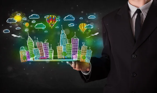 Young person showing tablet with hand drawn cityscape — Stock Photo, Image