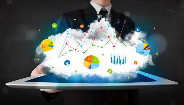 雲技術及び図表を用いたタッチパッドを有する者 — ストック写真