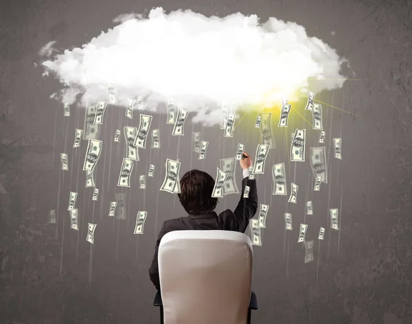 Business man in suit looking at cloud with falling money — Stock Photo, Image