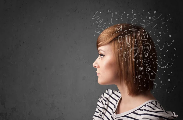 Young girl thinking with abstract icons on her head — Stock Photo, Image