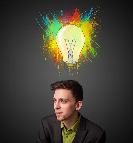 Businessman thinking with lightbulb above his head — Stock Photo, Image