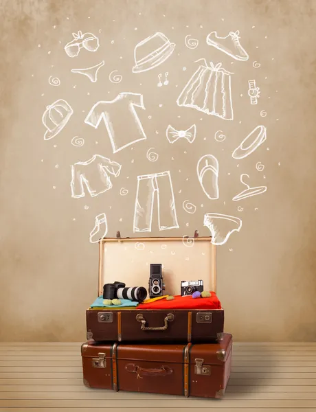 旅行者の荷物を持つ手描き下ろしの服とアイコン — ストック写真