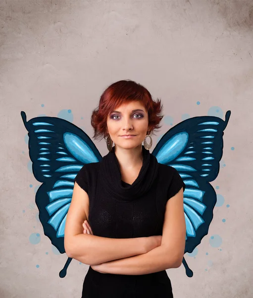 Mladá dívka s motýlí modré ilustrace na zadní straně — Stock fotografie