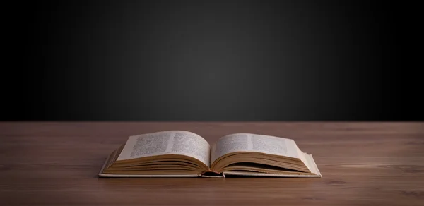 Open book on wooden deck — Stock Photo, Image