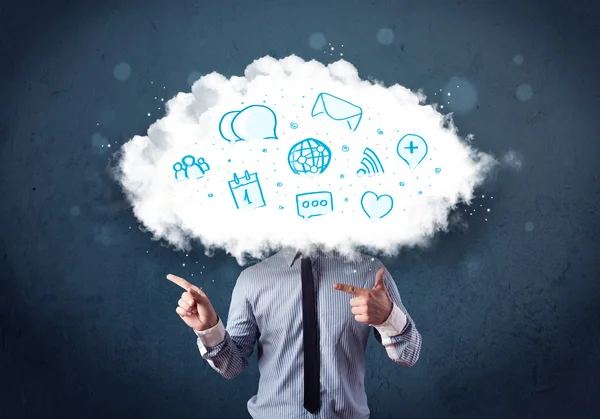 Man in suit with cloud head and blue icons — Stock Photo, Image