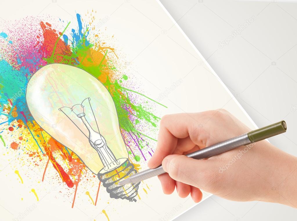 Hand drawing colorful idea light bulb with a pen