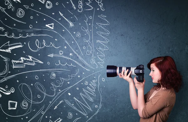 Photographer shooting images while energetic hand drawn lines an — Stock Photo, Image