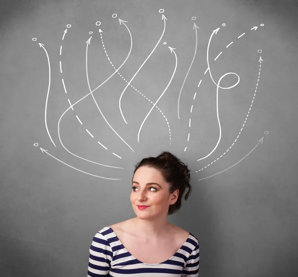 Young woman with arrows coming out of her head — Stock Photo, Image