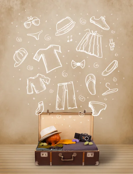 Traveler luggage with hand drawn clothes and icons — Stock Photo, Image