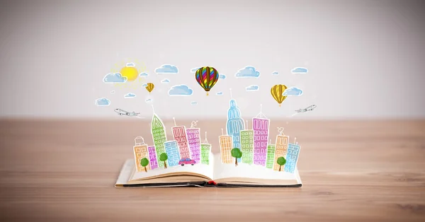 Cityscape drawing on open book — Stock Photo, Image