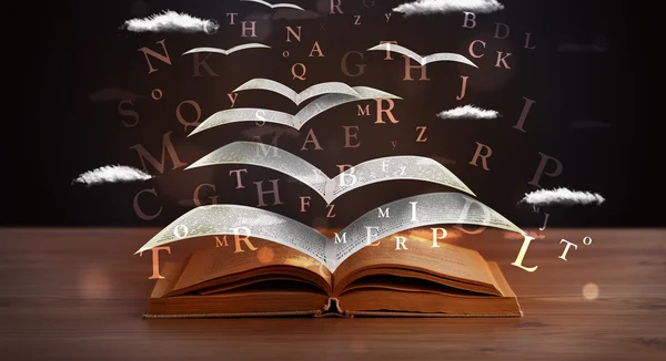 Pagina 's en gloeiende letters die uit een boek vliegen — Stockfoto