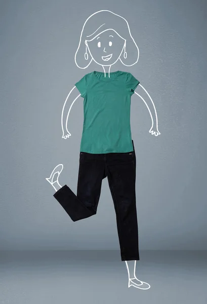 Размещение одежды в действии с женским рисунком — стоковое фото