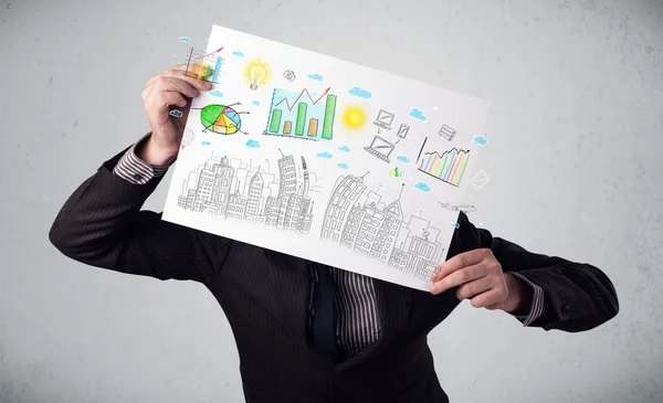 Businessman holding a paper with charts and cityscape in front o — Stock Photo, Image