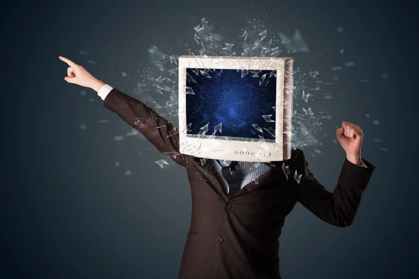 Computer monitor screen exploding on a young persons head — Stock Photo, Image