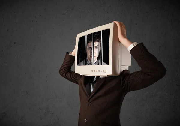 Geschäftsmann mit Monitor auf dem Kopf in digitalem System gefangen — Stockfoto