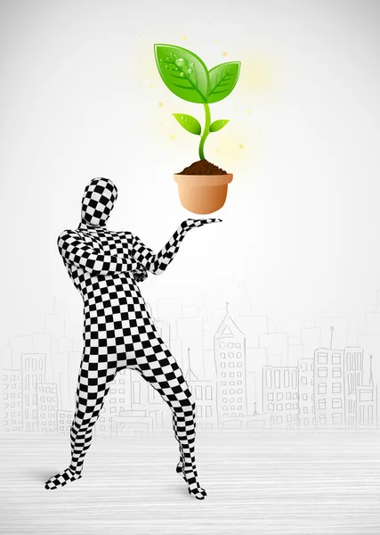 Man in full body suit with eco plant — Stock Photo, Image