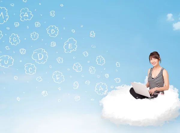 Young woman sitting in cloud with laptop — Stock Photo, Image