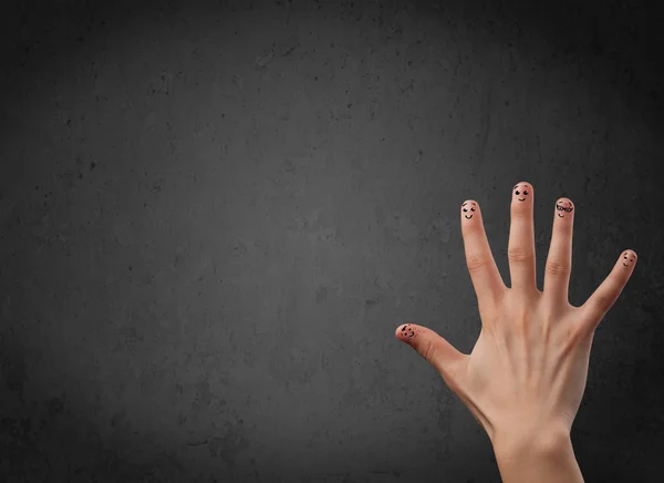 Happy finger smileys with empty copy space dark background — Stock Photo, Image