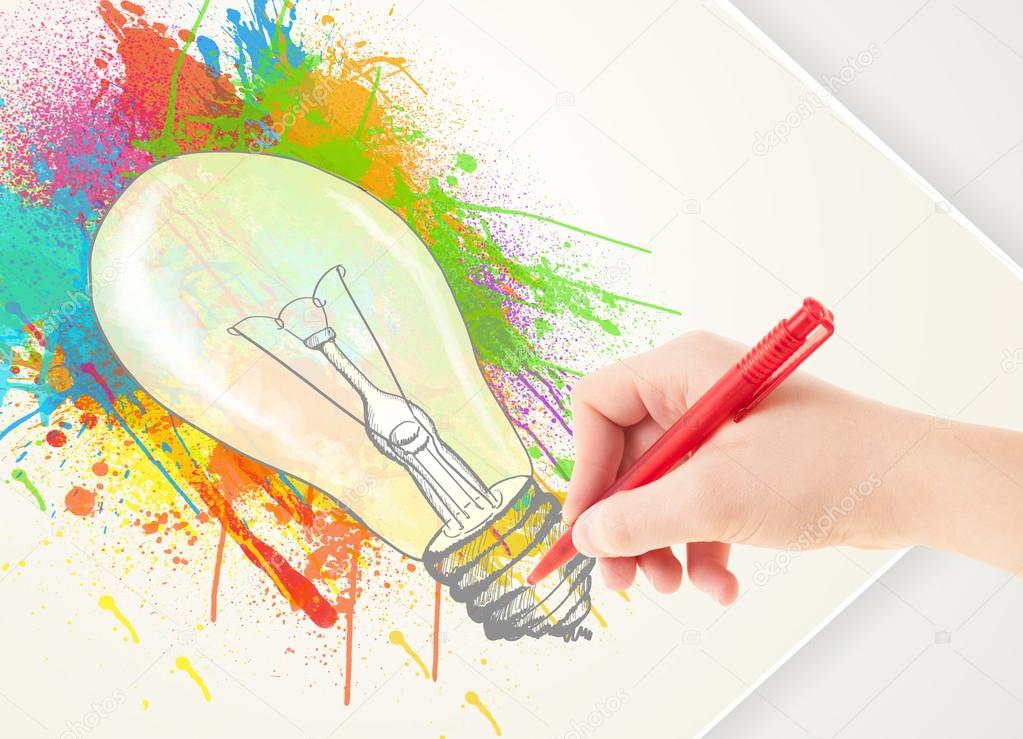 Hand drawing colorful idea light bulb with a pen