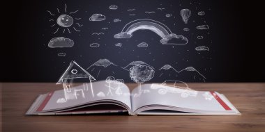 Elle çizilmiş peyzaj ile açık kitap