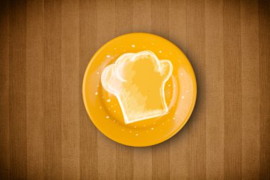 El çizimi beyaz şef sembollü renkli bir tabak.