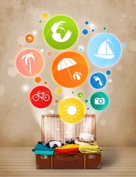 Suitcase with colorful summer icons and symbols — Stock Photo, Image