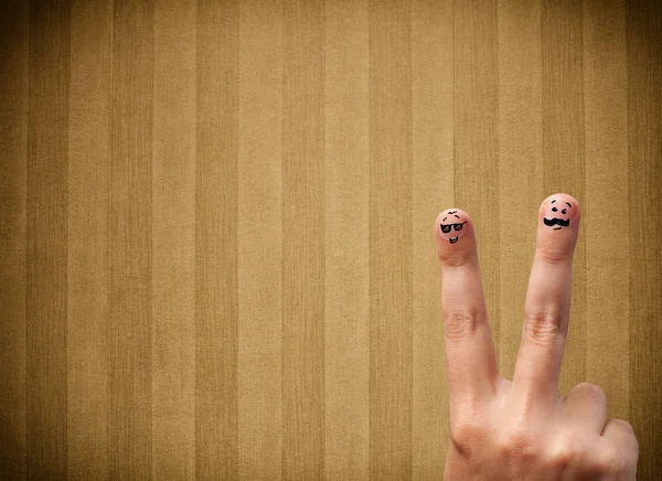 Happy finger smileys with vintage stripe wallpaper background — Stock Photo, Image