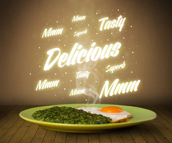 Food plate with delicious and tasty glowing writings — Stock Photo, Image